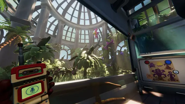 A walkie-talkie in front of a greenhouse observation window